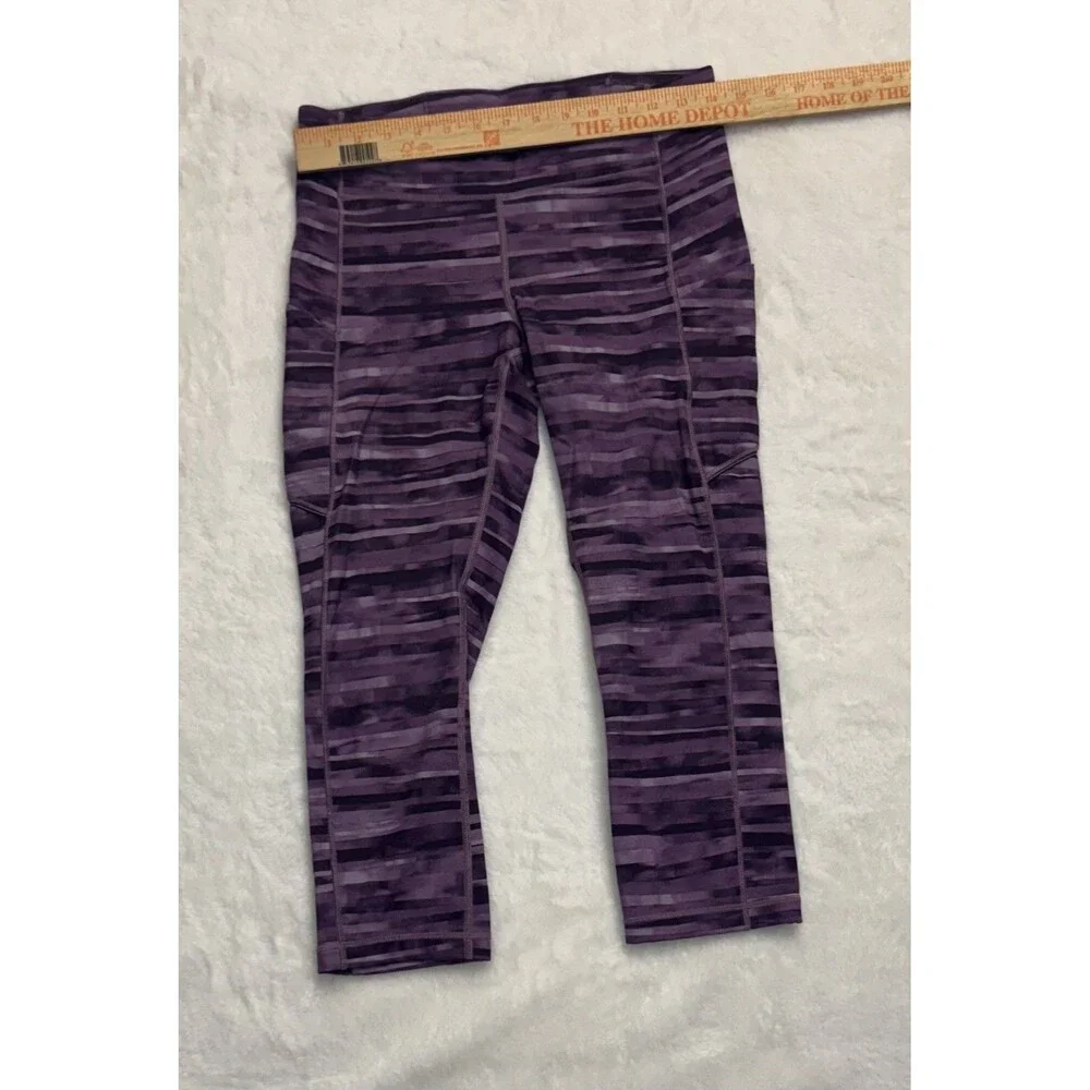 lululemon cropped purple leggings size 8 speed it up zip waist pocket